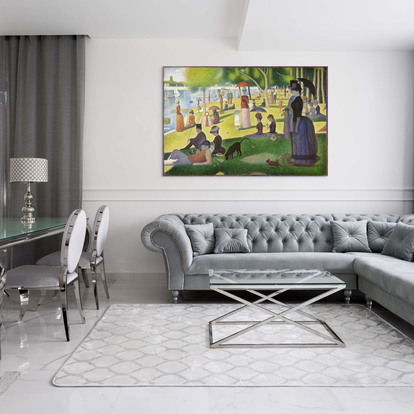 a living room with a couch and a painting on the wall