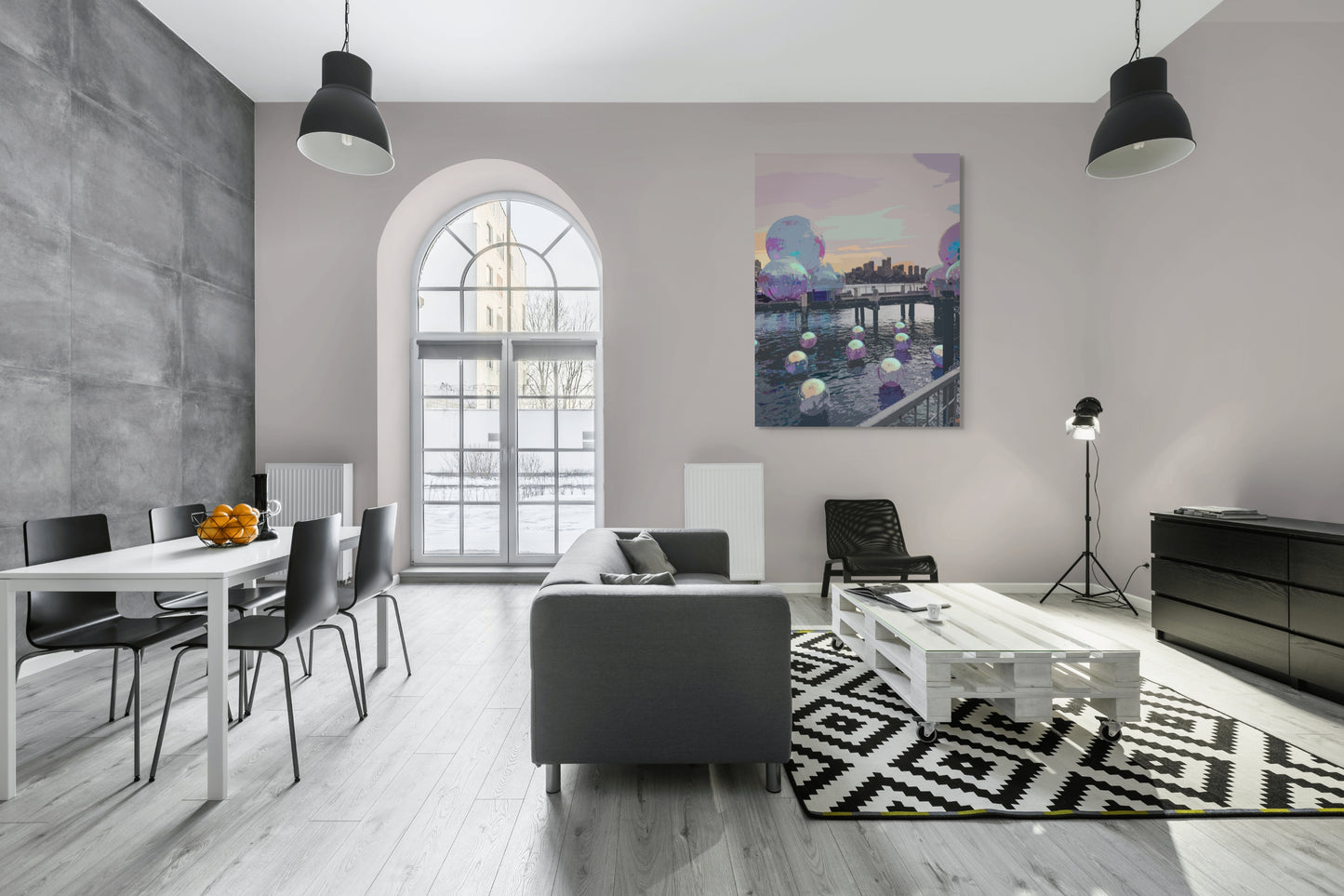 Ocean Spheres Canvas Wall Art in loft lounge room, with arch window, white table and four black chairs, grey lounge, two black pendant lights and square rug
