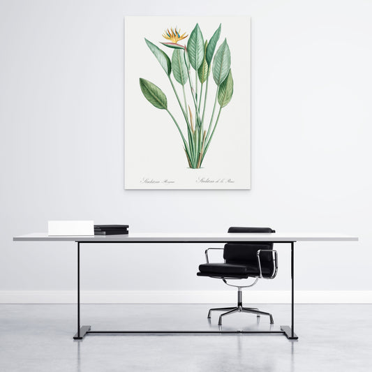 a desk with a chair and a painting on the wall