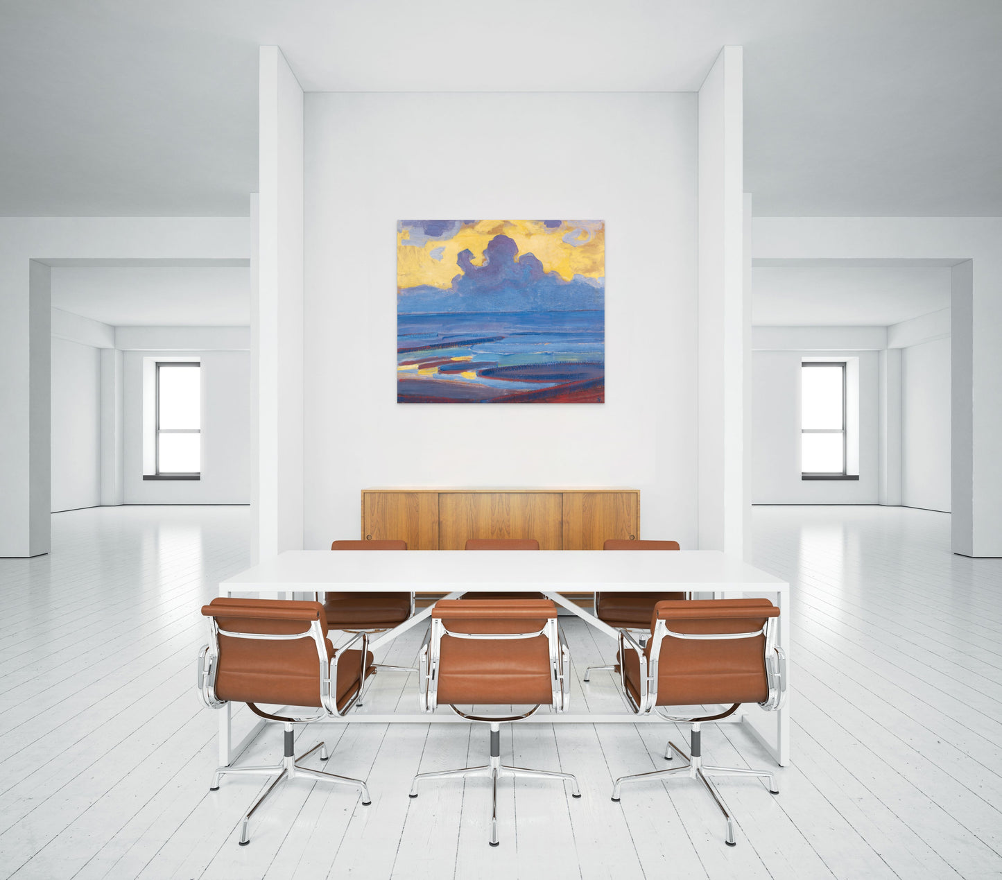 a room with a table and chairs and a painting on the wall