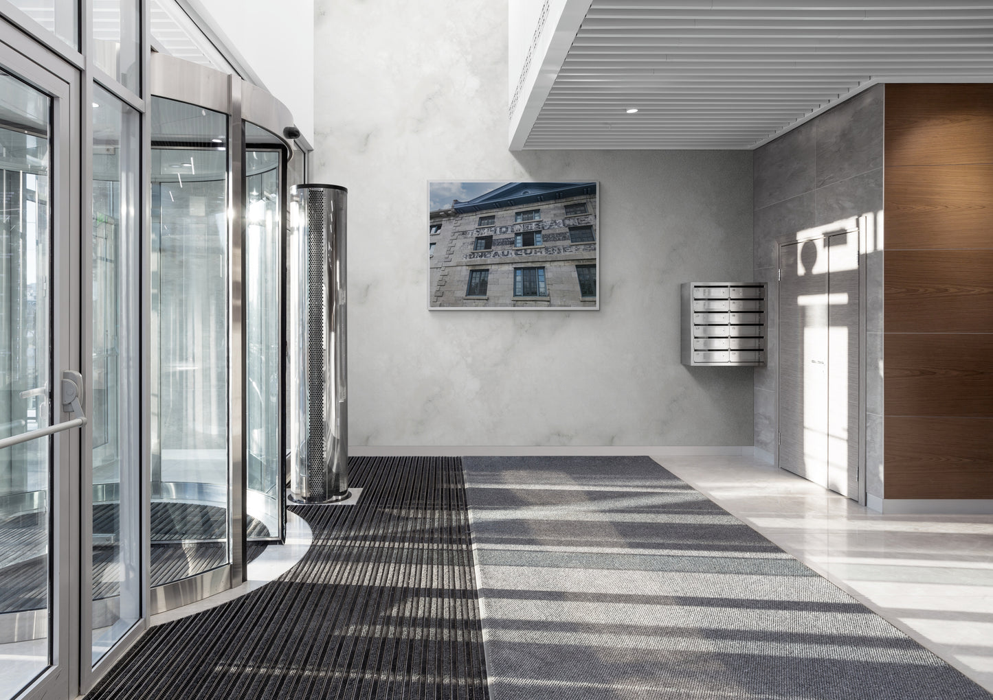 Old Warehouse Canvas Wall Art in office front foyer with marble wall, letterboxes, square mat, ribbed mat, revolving door and downlight