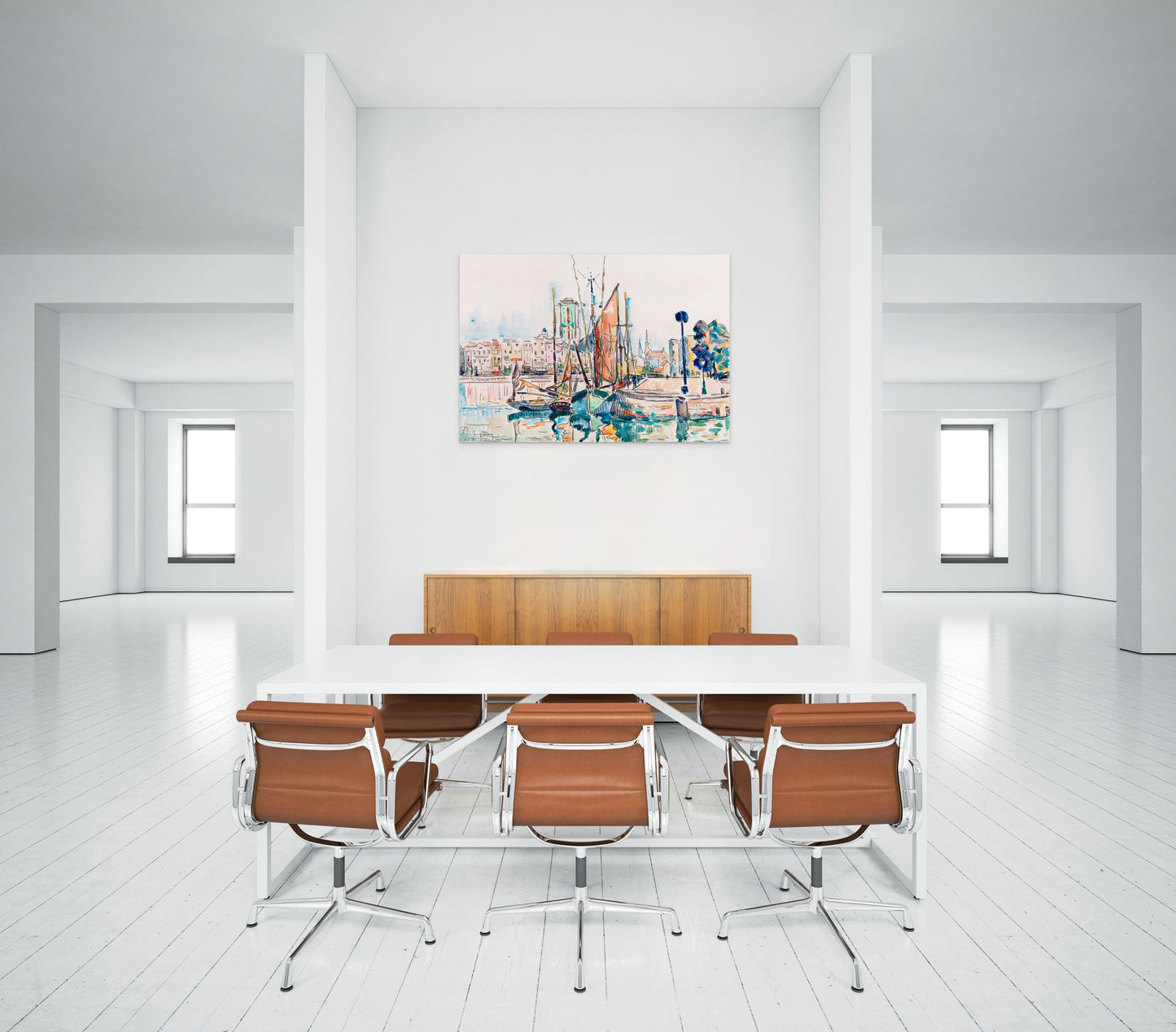 a room with a table and chairs and a painting on the wall