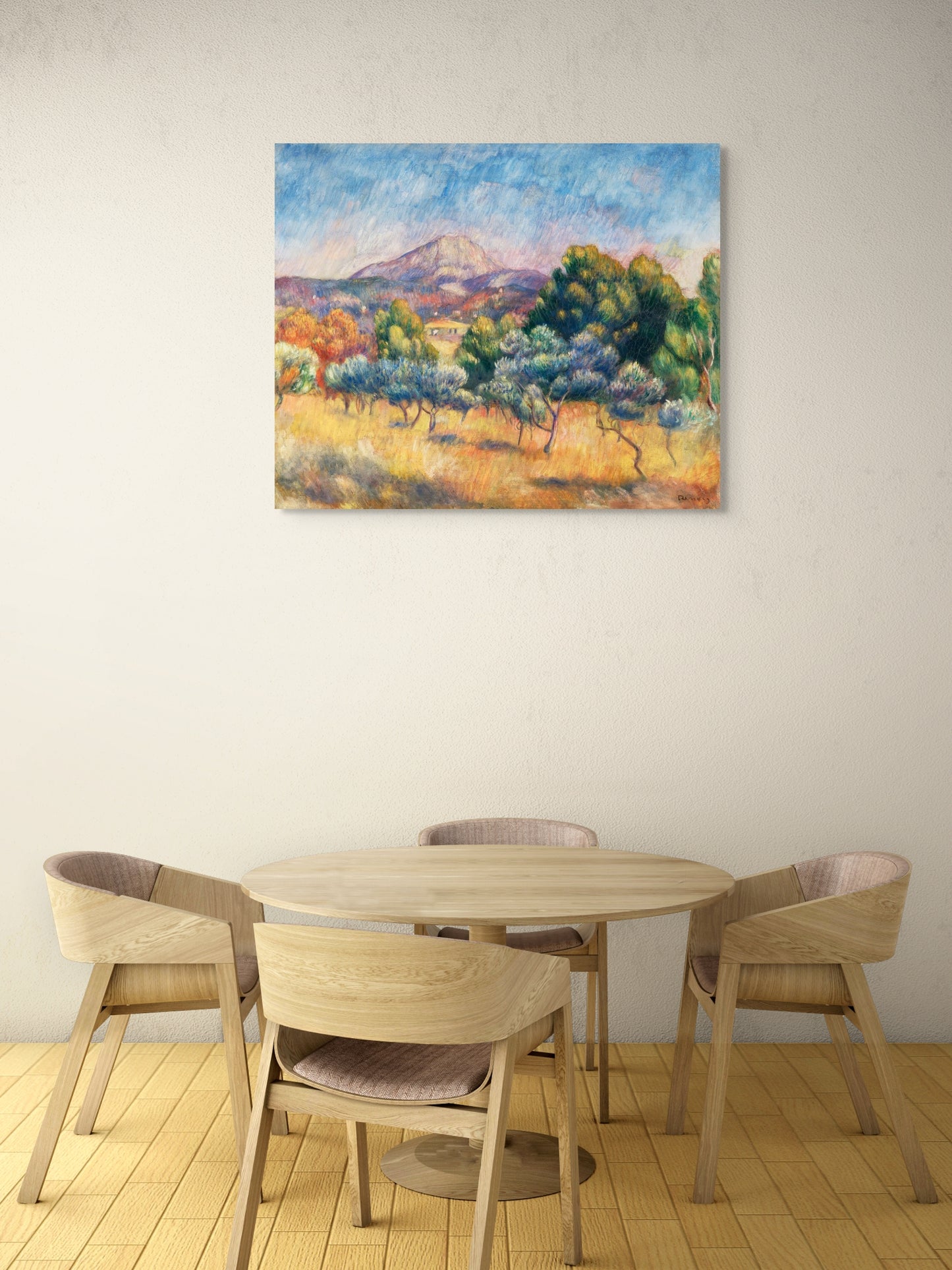 a painting on a wall above a table and chairs