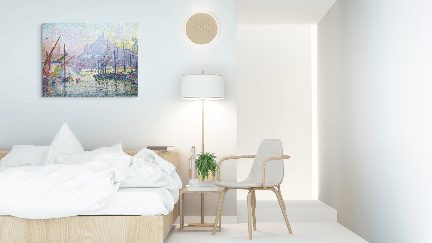 a bedroom with a bed, chair and a painting on the wall