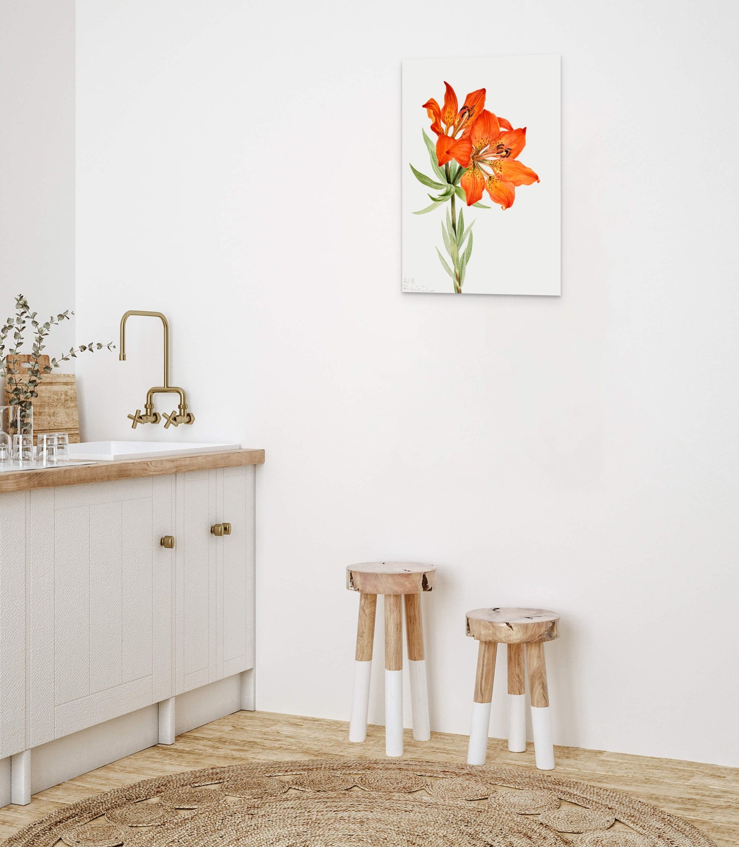 a bathroom with a sink and two stools