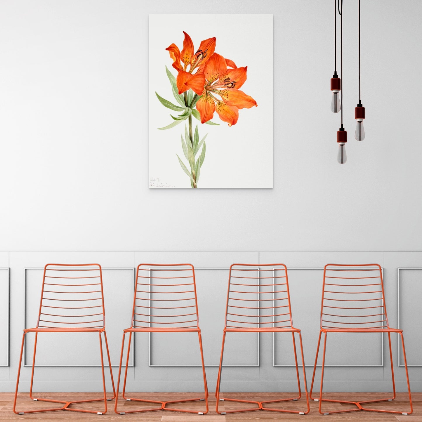 three orange chairs in a room with a painting on the wall