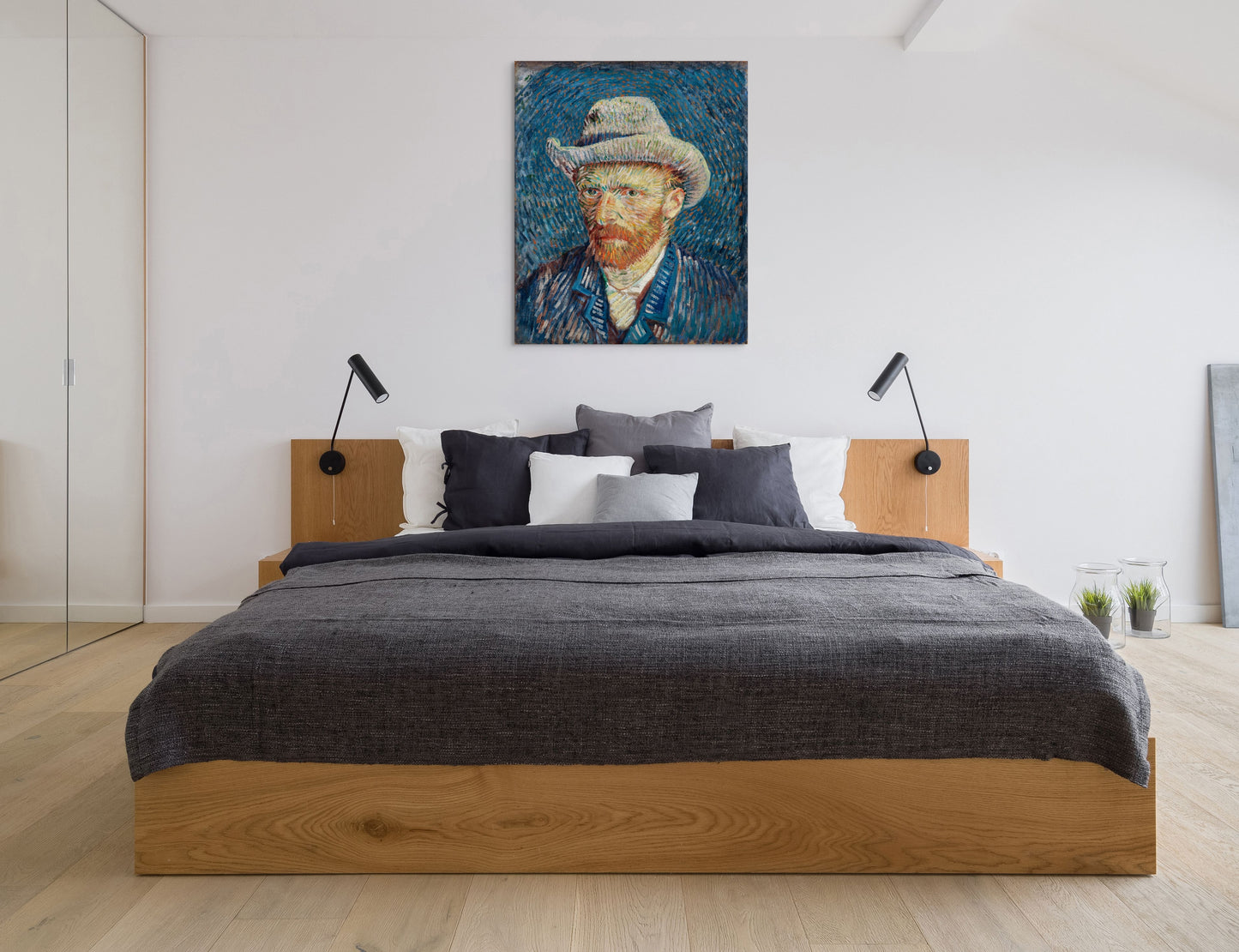 a bedroom with a large bed and a painting on the wall