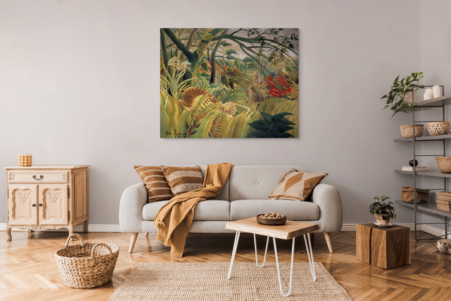 a living room filled with furniture and a painting on the wall