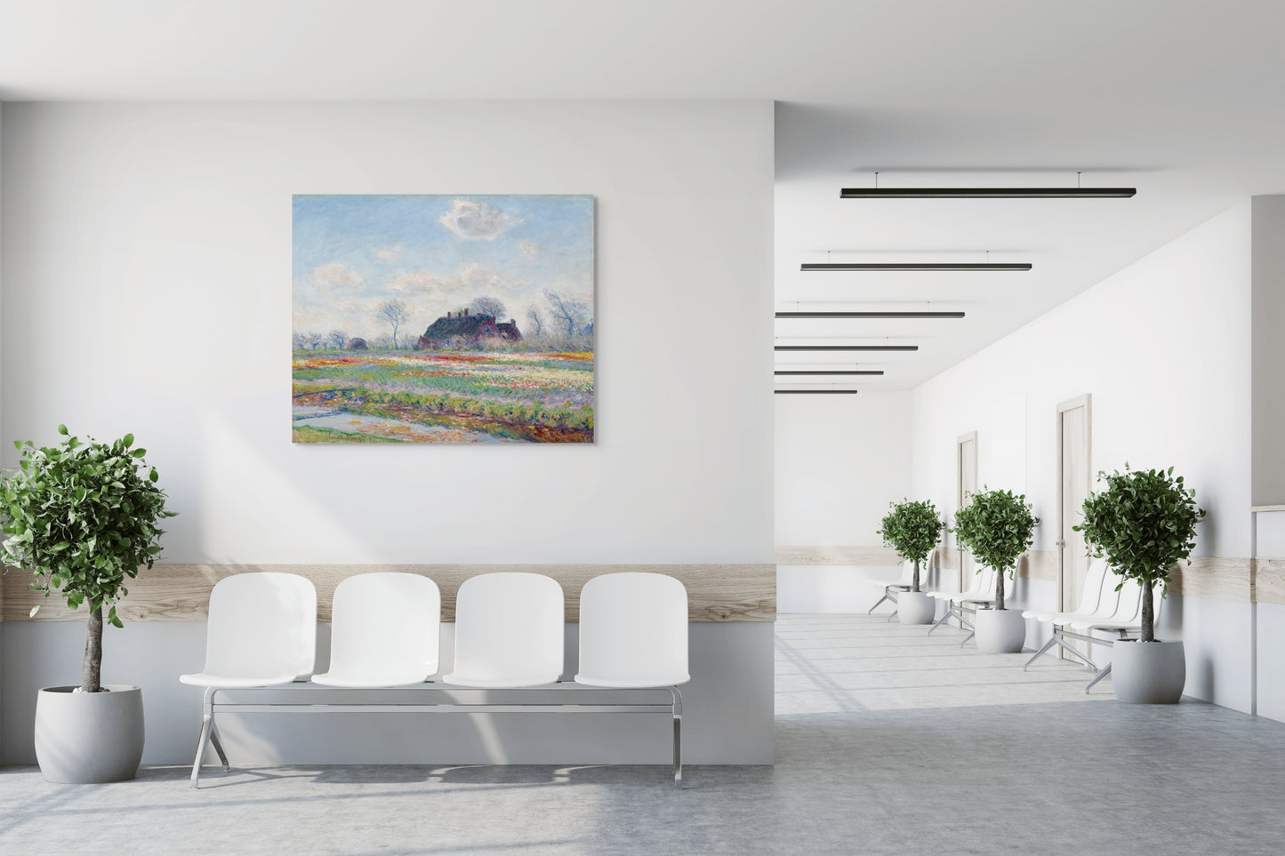 a painting hanging on the wall of a waiting room