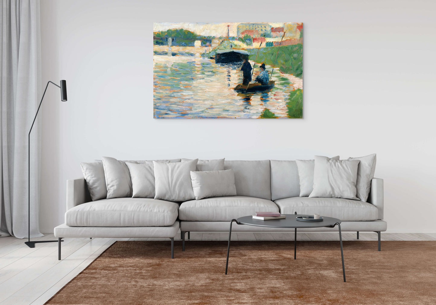 a living room with a couch and a painting on the wall