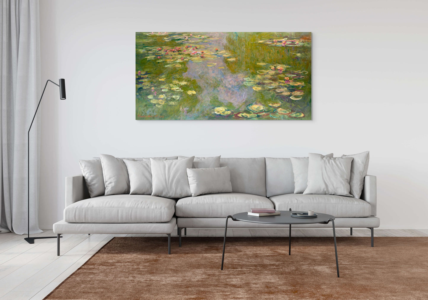 a living room with a couch and a painting on the wall