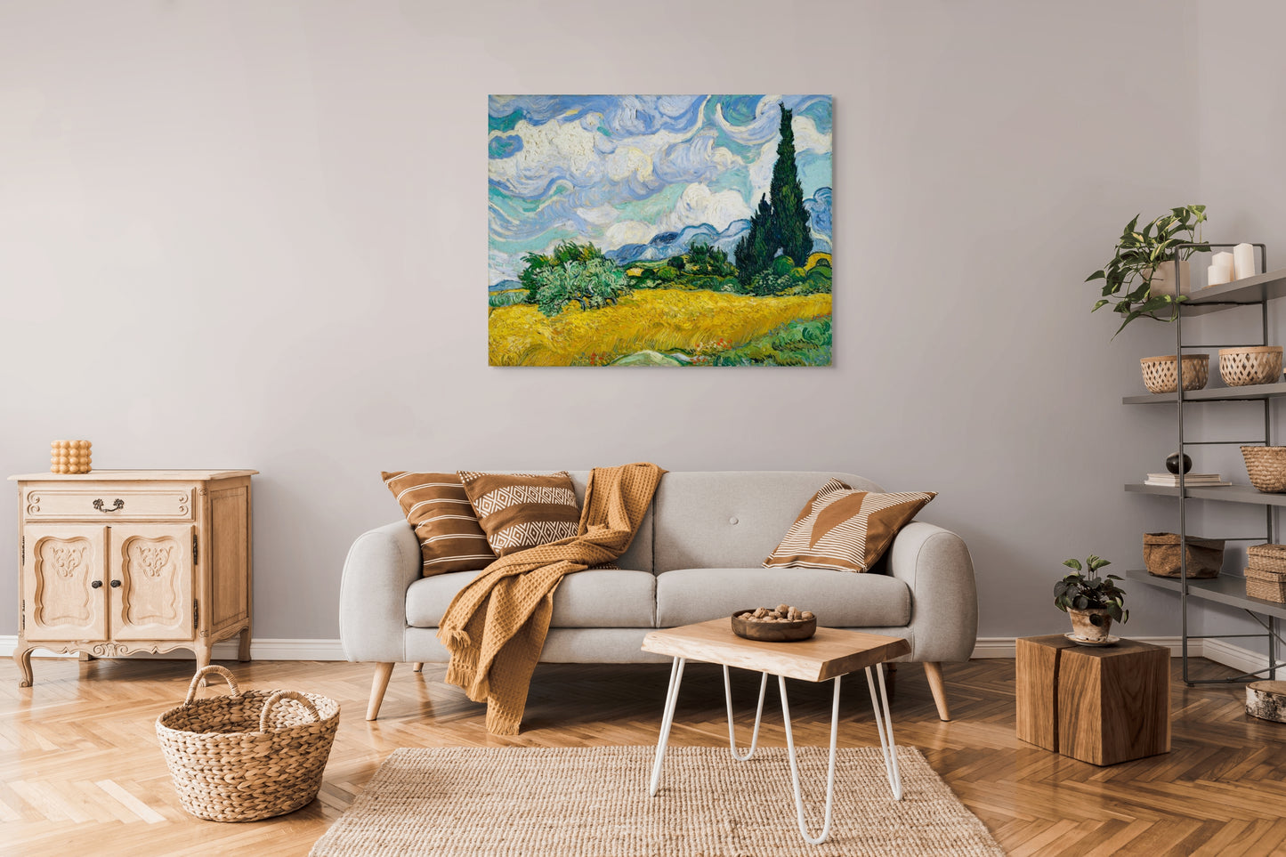 a living room with a couch and a painting on the wall