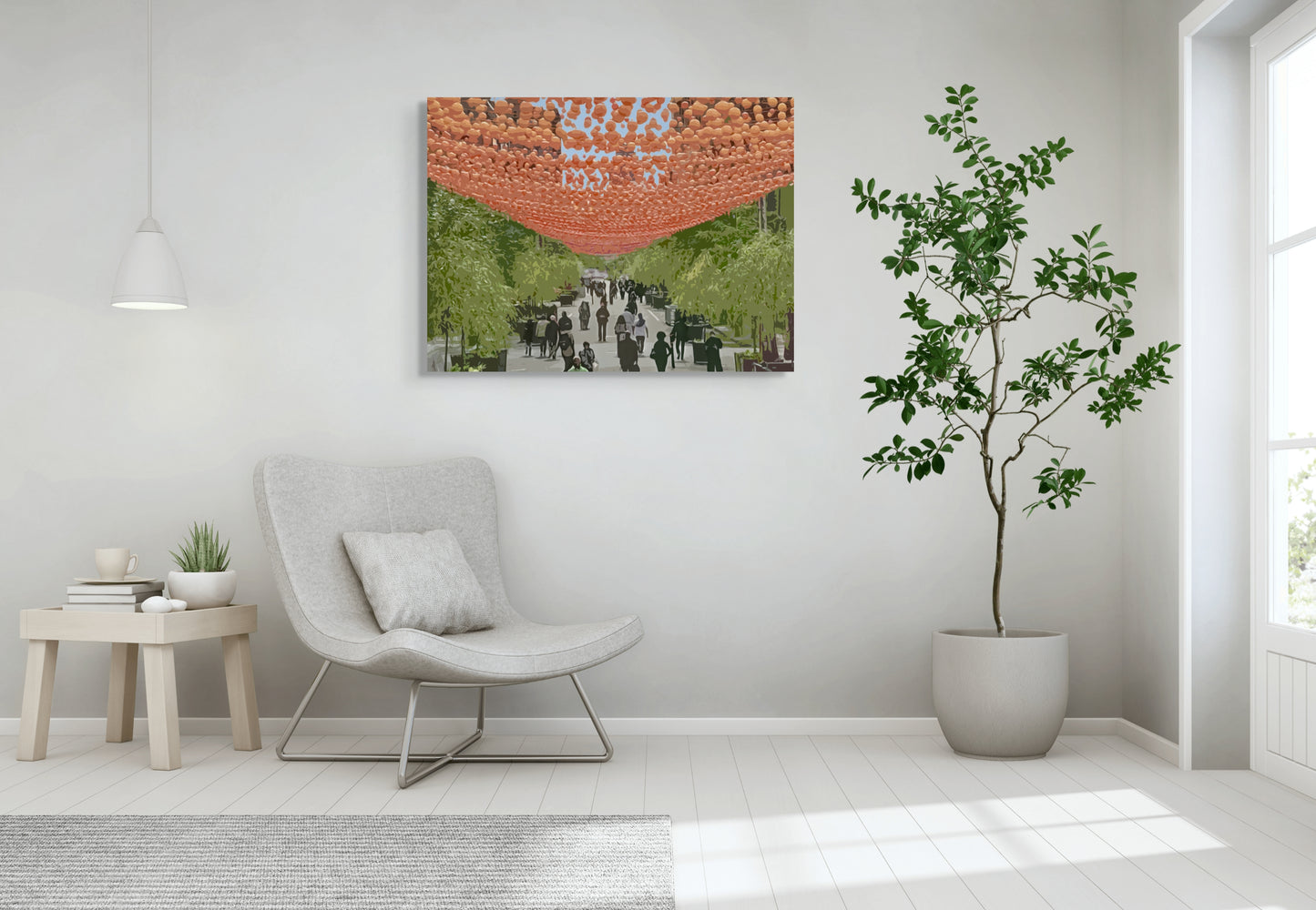 The Village Canvas Wall Art in lounge room with white wall, pendant light, pot plant, grey chair, wooden side table, white floorboards and grey rug