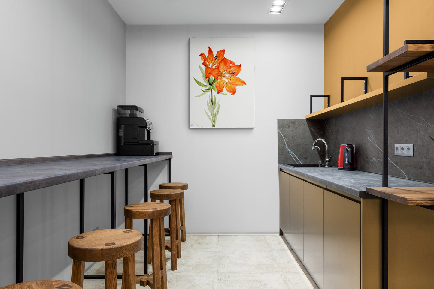 a kitchen with a counter, stools and a painting on the wall
