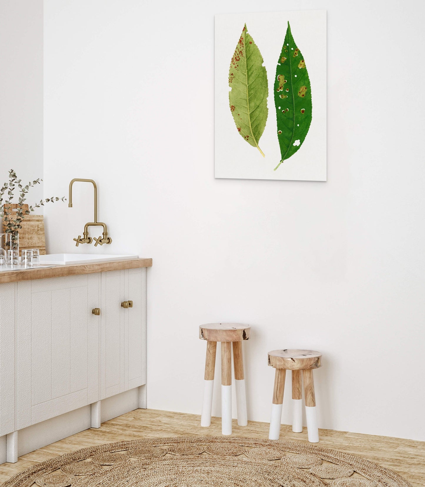 a bathroom with two stools and a painting on the wall